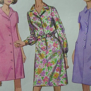 May include: Three different styles of button-up dresses. The dress on the left is pink, the dress in the center is floral, and the dress on the right is purple.