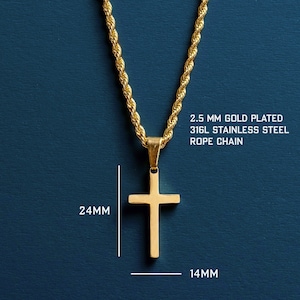May include: Gold-plated cross pendant necklace with a 2.5 mm rope chain. The cross measures 24mm in height and 14mm in width. The necklace is made of 316L stainless steel. The background is a dark teal color.