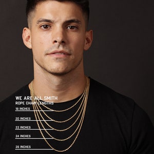May include: A man wearing a black t-shirt with multiple gold rope chain necklaces of varying lengths. The image includes text that reads "WE ARE ALL SMITH" and "ROPE CHAIN LENGTHS" with chain lengths of 18, 20, 22, 24, and 26 inches.