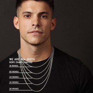 May include: A man wearing a black t-shirt, showcasing a silver rope chain necklace. The image displays various chain lengths: 18, 20, 22, 24, and 26 inches. Text on the image reads "WE ARE ALL SMITH" and "ROPE CHAIN LENGTHS."