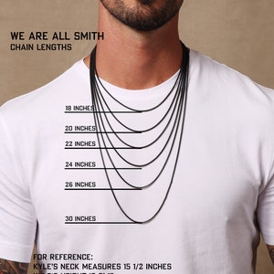 May include: A man wearing a white t-shirt is modelling different chain lengths. The chains are black and range from 18 to 30 inches. The text "WE ARE ALL SMITH CHAIN LENGTHS" is at the top of the image. The text "FOR REFERENCE: KYLE'S NECK MEASURES 15 1/2 INCHES KYLE'S HEIGHT IS 6' 1". IF YOU ARE VERY TALL, HUSKY, MUSCULAR, THE SHORTEST LENGTHS MIGHT NOT FIT YOU, SO WE RECOMMEND USING A STRING TO MEASURE YOUR IDEAL LENGTH SO YOU ORDER ACCORDINGLY." is at the bottom of the image.