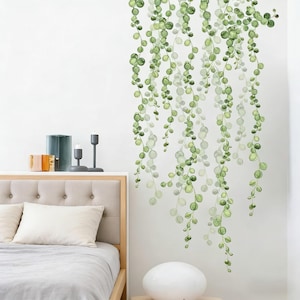 May include: A set of three ceramic mugs with a speckled, matte finish. The mugs are in shades of cream, light gray, and dark gray. Each mug has a simple, minimalist design, perfect for coffee or tea.