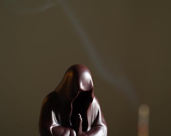 Lerskulptur, tedjur: Ansiktslös munk