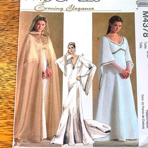 May include: A sewing pattern for three different styles of gowns. The pattern is for sizes 12-18 and is called "Evening Elegance" with the pattern number M4378. The gowns are all white with gold accents. The first gown is a long, flowing gown with a cape. The second gown is a long, flowing gown with a fitted bodice. The third gown is a long, flowing gown with a scoop neckline.
