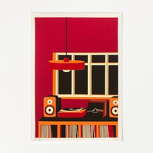 May include: A screen print illustration featuring a red wall with a dotted texture, a hanging red pendant light, and a window. A black table holds two orange speakers, a record player, and a stack of vinyl records, with more records stored below.