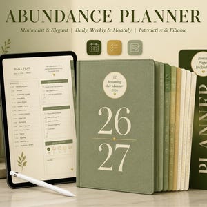 May include: An Abundance Planner set featuring a digital tablet displaying a daily plan page with a stylus, alongside a physical sage green hardcover planner labeled 26 27 and becoming her planner 2026. The set includes bonus pages and tabs.