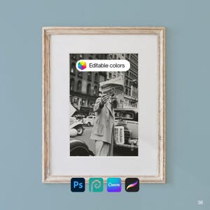 May include: A framed black and white photograph featuring a person in a suit holding a newspaper over their face in a city street setting. The newspaper displays the text Social Justice. The frame is light wood with a white mat border.