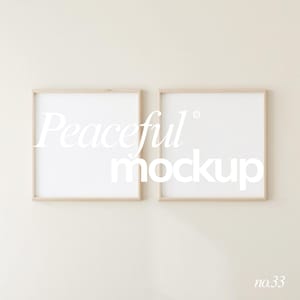 May include: Two square, light wood framed blank art prints or posters hanging on a cream-coloured wall. The text "Peaceful mockup" is overlaid on the prints in white, with the number "no.33" in the bottom right corner.