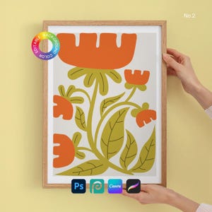 May include: A framed art print featuring a stylized floral design in orange, green, and cream colors. The artwork has a mid-century modern aesthetic. The frame is made of light-colored wood. The image also includes the text "No. 2".