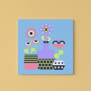 May include: A square canvas print featuring a stylized floral arrangement. The artwork showcases flowers in pink, purple, and black pots against a light blue background. The flowers have geometric shapes and bright colors, creating a modern, playful aesthetic.