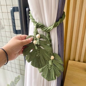 May include: A rustic wooden sign with the text "Welcome to our home" in a handwritten style. The sign features a distressed finish and a simple, inviting design, perfect for a front porch or entryway.