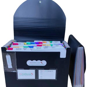 May include: A black expandable file organizer with labeled dividers. The organizer includes a USB drive and has the text "EmGoKits.com Be Prepared, Be Quick, Be Safe". The file organizer is designed to hold documents and records.