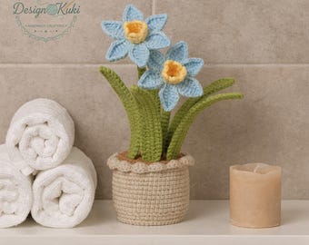 Fleurs de jonquilles au crochet dans un pot beige
