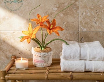 Lys orange au crochet dans un pot beige