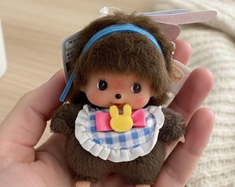 ヴィンテージ限定 - 眼鏡をかけた大きな頭のモンチッチ、ピンクの