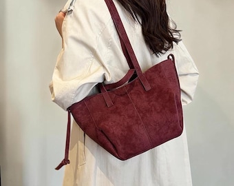 Bolso tipo cartera estructurado, bolso de mano minimalista con asa superior, bolso de hombro clásico.
