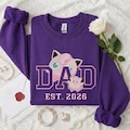 Embroidered Fire Dragon T-shirt, Water Turtle Sweatshirt, Pink Monster Hoodie, Vintage Dad Est 2026 Retro Fatherhood Apparel product logo
