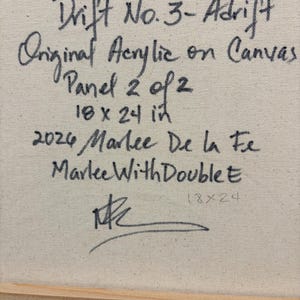 May include: A beige canvas surface featuring black handwritten text that reads: Drift No. 3- Adrift, Original Acrylic on Canvas, Panel 2 of 2, 18 x 24 in, 2024 Marlee De la Fe, MarleeWithDoubleE, and a signature at the bottom.