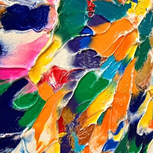 May include: An abstract painting on canvas featuring thick, impasto-style brushstrokes in vibrant colors including bright orange, deep blue, emerald green, hot pink, and sunny yellow, with visible texture and layered paint application.