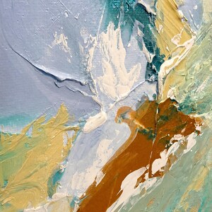 May include: An abstract oil painting on canvas featuring thick, textured impasto brushstrokes. The color palette includes shades of light blue, turquoise, cream, and a prominent diagonal streak of earthy brown, creating a layered, tactile surface.