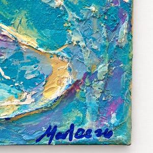 May include: An oil painting on canvas featuring thick, textured impasto brushstrokes in shades of turquoise, cerulean blue, white, and hints of purple. The bottom right corner displays a signature in dark blue paint reading Marlee 20.