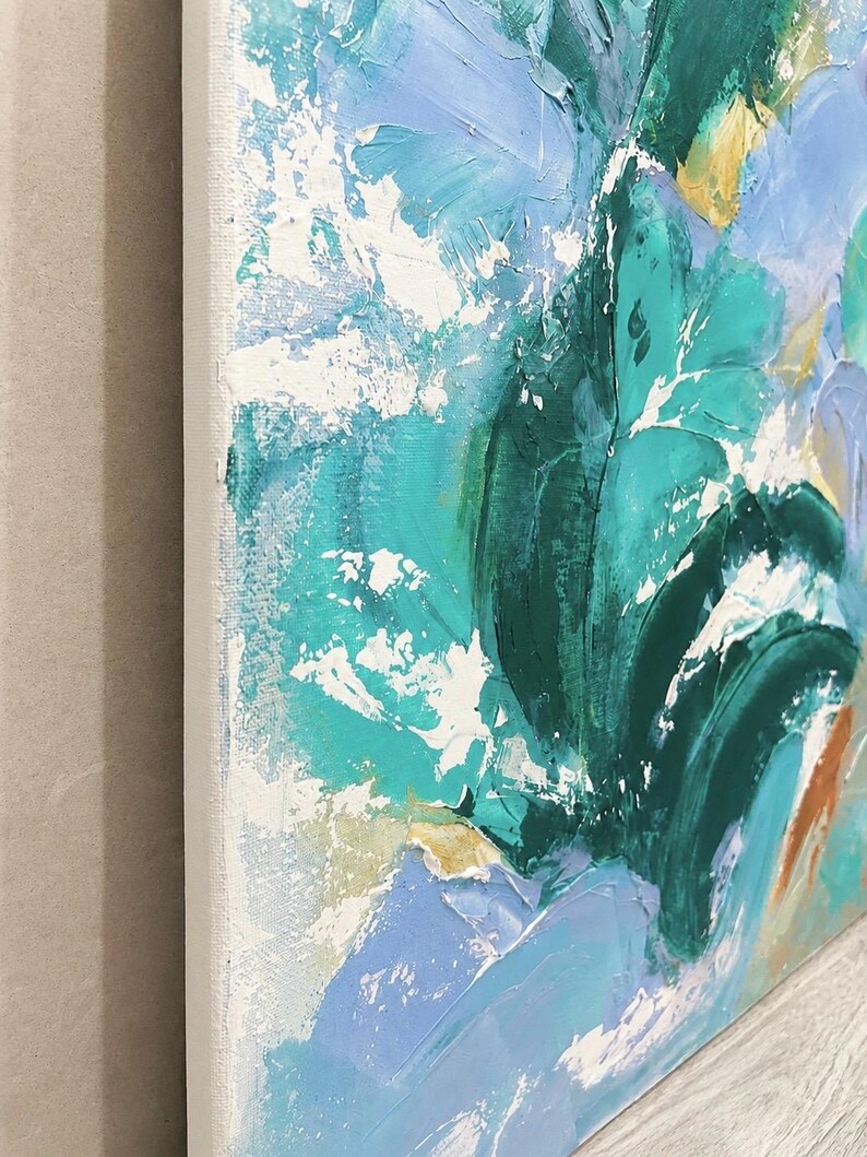 May include: An abstract painting on canvas featuring thick, textured impasto brushstrokes in shades of teal, forest green, light blue, and white. The composition displays layered paint application with visible depth and a prominent white edge.