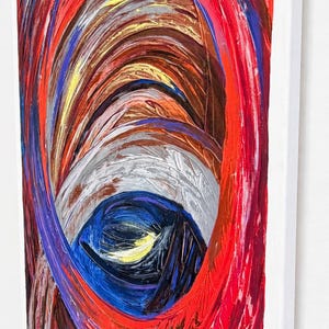 May include: An abstract painting on a rectangular canvas featuring thick, textured impasto brushstrokes in vibrant shades of red, deep blue, brown, and white. The composition consists of swirling, circular patterns that create a sense of depth.