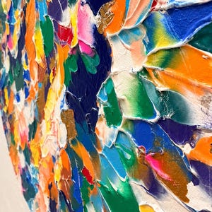 May include: An abstract oil painting on canvas featuring thick, textured impasto brushstrokes in vibrant shades of orange, royal blue, emerald green, yellow, magenta, and white, creating a dynamic and layered surface composition.