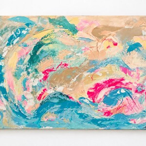 May include: An abstract painting on canvas featuring thick, textured brushstrokes in shades of teal, bright pink, soft peach, and metallic gold. The composition displays swirling, layered paint applications with visible impasto techniques.
