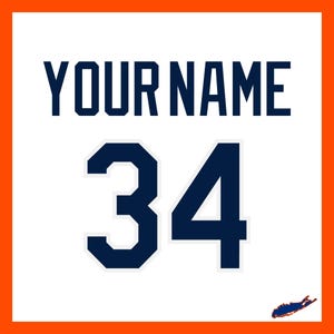 May include: White jersey with the text "YOUR NAME" above the number "34" in navy blue. The jersey has an orange border and a small Long Island outline in the bottom right corner.