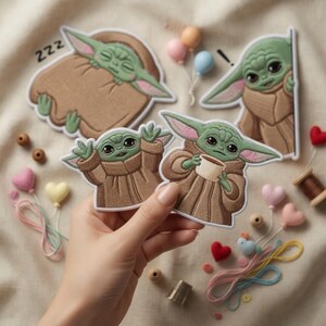 May include: Embroidered patches featuring the character Grogu from The Mandalorian. The patches depict Grogu in various poses, including sleeping, surprised, and holding a cup. The patches are brown, green, and tan.