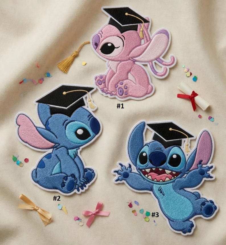 May include: Embroidered patches featuring cartoon characters in graduation caps. The patches include a pink character and two blue characters, each with a unique pose. A rolled diploma with a red ribbon and confetti are also present.