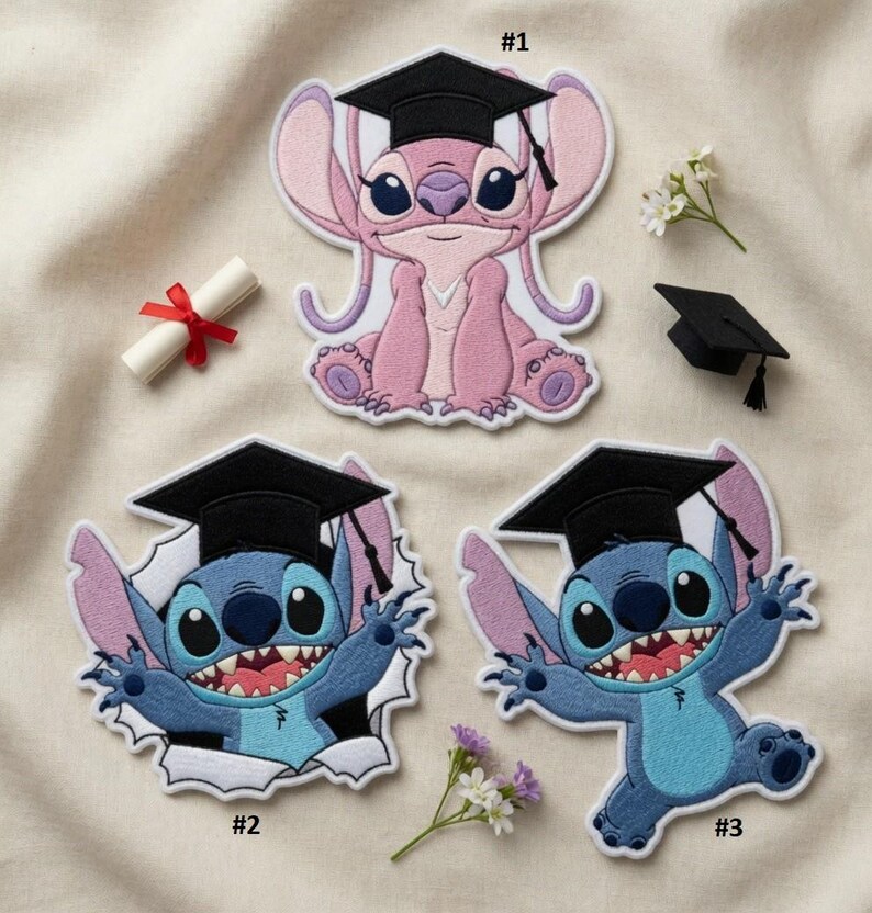 May include: Embroidered patches featuring characters from a popular animated film, wearing graduation caps. The patches are in shades of pink and blue, with black caps and white accents. A rolled diploma with a red ribbon is also present.
