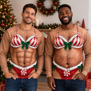 May include: A tan long-sleeve crewneck sweatshirt featuring a printed graphic of a torso with a hairy chest, a red and white striped candy cane bikini top with green bows, and matching bikini bottoms with white faux fur trim and peppermint candy accents.