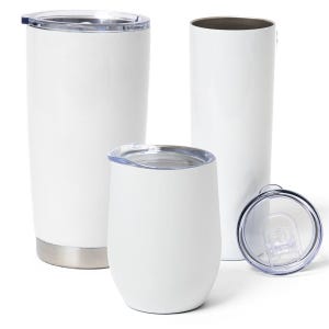 May include: A collection of three white tumblers with smooth finishes. One tall tumbler features a clear plastic lid, a second tall tumbler is open at the top, and a third shorter, rounded tumbler includes a clear plastic lid placed beside it.