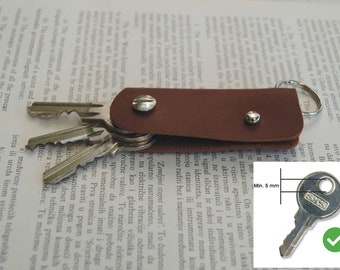 Key holder, holds 1-4 regular keys, soft leather, 5 mm shaft ( 13/64 inch )