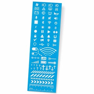 May include: A rectangular blue stencil sheet featuring a variety of white icons including automotive symbols, media controls, connectivity indicators, cross shapes, and hazard stripes. A ruler with inch and centimeter markings is at the bottom.