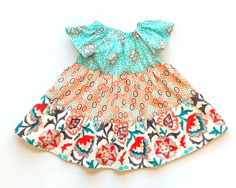 teal and coral dress