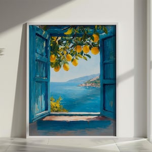 May include: A framed painting shows a coastal scene. A blue window frames a view of the sea and a distant town. Lemon branches with ripe yellow fruit hang above. The artwork is displayed on a white wall.