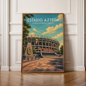 May include: A framed art print featuring a stylized illustration of Estadio Azteca in Mexico City. The image displays the stadium exterior, a stone monument with a circular logo, and the text Estadio Azteca Ciudad de México, México.