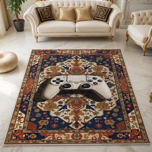 Puede incluir: Una alfombra rectangular con un diseño tradicional en tonos azules, rojos y beige. Un mando de videojuegos blanco está colocado sobre la alfombra. La alfombra tiene un patrón detallado y ornamentado.