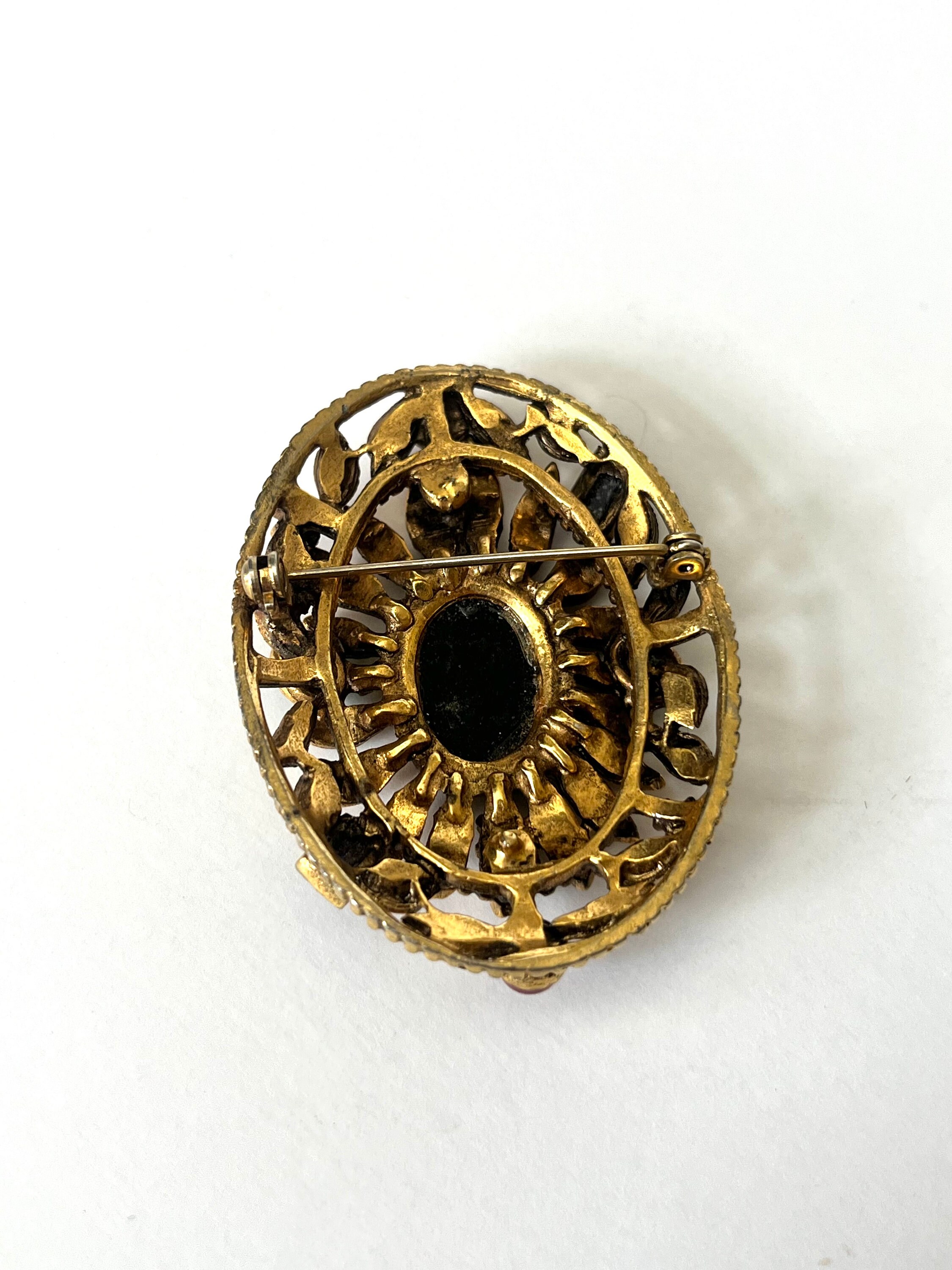 Pendentif-broche or 18 carats onyx et perle Pendentif-broche or 18 carats onyx et perle