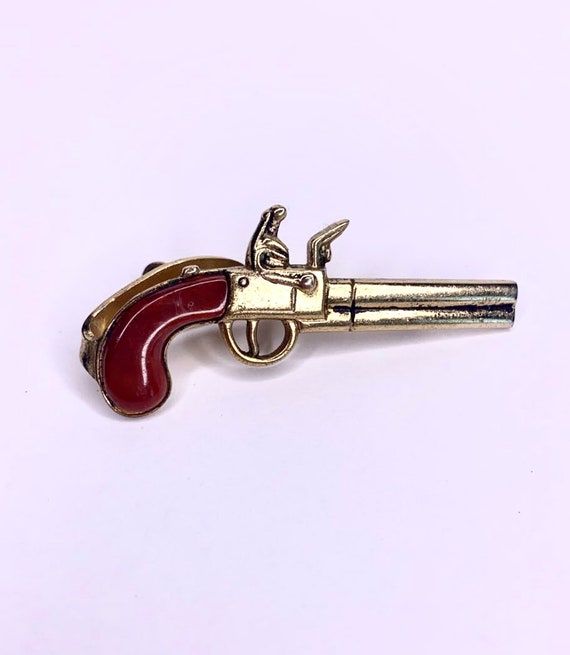 Vintage gold tone gun tie clip by Pioneer