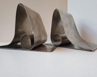 Brushed metal steel role bookends rare, 1990's