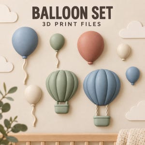 May include: A collection of 3D printed balloon and hot air balloon wall decorations in muted blue, green, beige, and terracotta tones. The set includes various sizes of balloons with wavy strings and two hot air balloons with baskets, accompanied by flat cloud shapes and the text BALLOON SET 3D PRINT FILES.