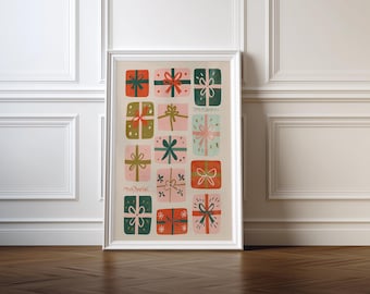 Puede incluir: Una impresión artística enmarcada que presenta una cuadrícula de cajas de regalo coloridas con lazos. Las cajas son en tonos de rojo, verde, rosa y dorado, con fondos blancos y crema. La impresión se muestra sobre un suelo de madera contra una pared blanca.