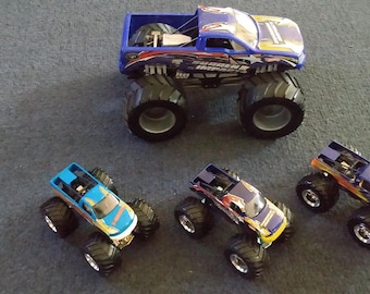 Group of 4 Hot Wheels Monster Jam Trucks