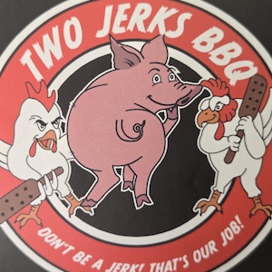 May include: A circular graphic with the text "TWO JERKS BBQ" in red. A pink pig is in the center, flanked by two chickens holding bats. The text "DON'T BE A JERK! THAT'S OUR JOB!" is in red around the bottom.