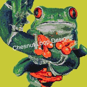 May include: A pixel art illustration of a red-eyed tree frog with vibrant green skin and bright orange feet, perched on a dark branch against a solid yellow background. The text Chesnut Loop Designs is overlaid in white across the center.