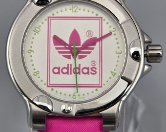 Reloj deportivo Adidas con esfera y correa rosas, 100 m, juego completo (caja y documentación), año 2000 (nuevo).